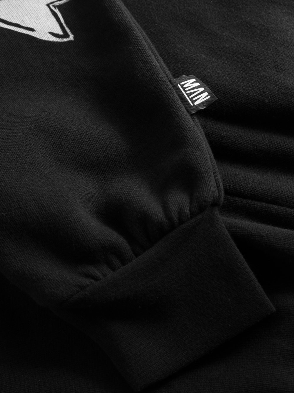 black unisex sweatpants detail label