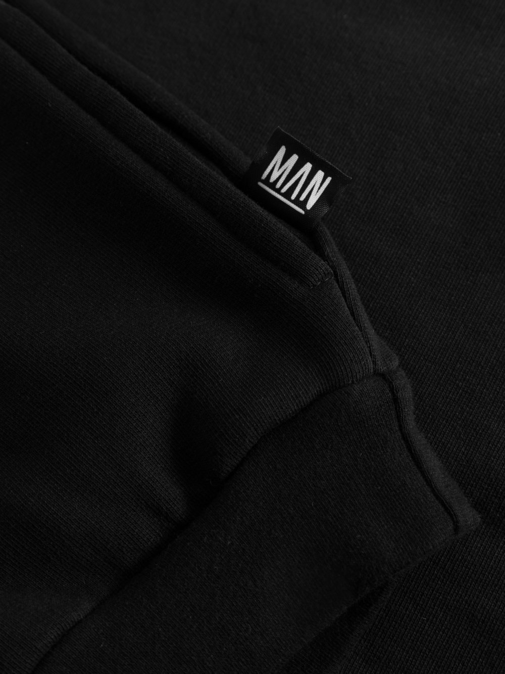 black organic hoodie detail label