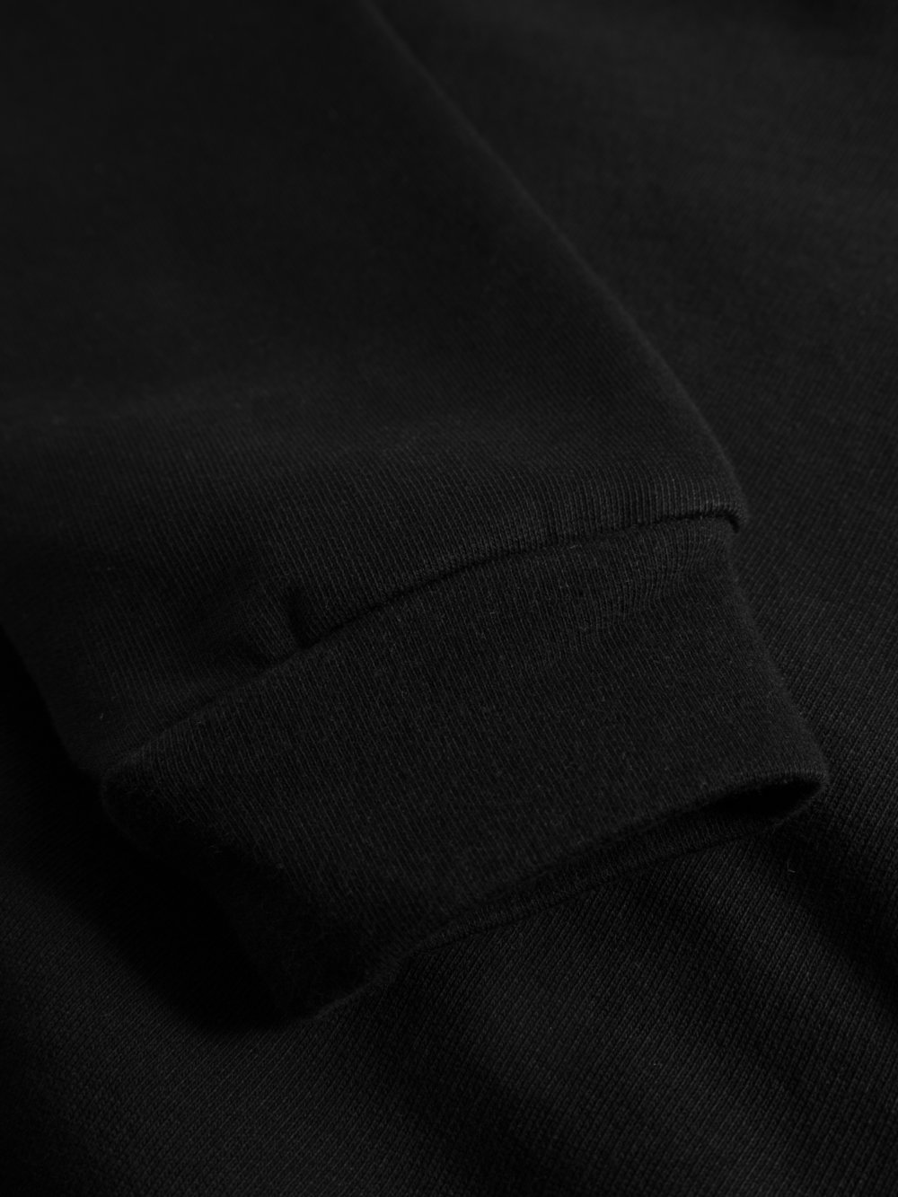 black organic hoodie detail sleeve