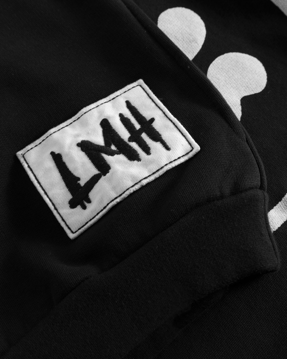 black sweat hoodie detail patch