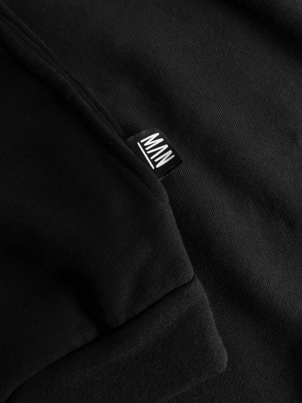 black unisex hoodie detail label